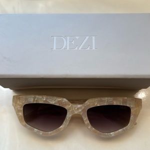 Dezi on read glasses